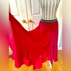 Anthropologie’s Vanessa Virginia Vibrant Flowing Fuchsia Pull On Midi Skirt